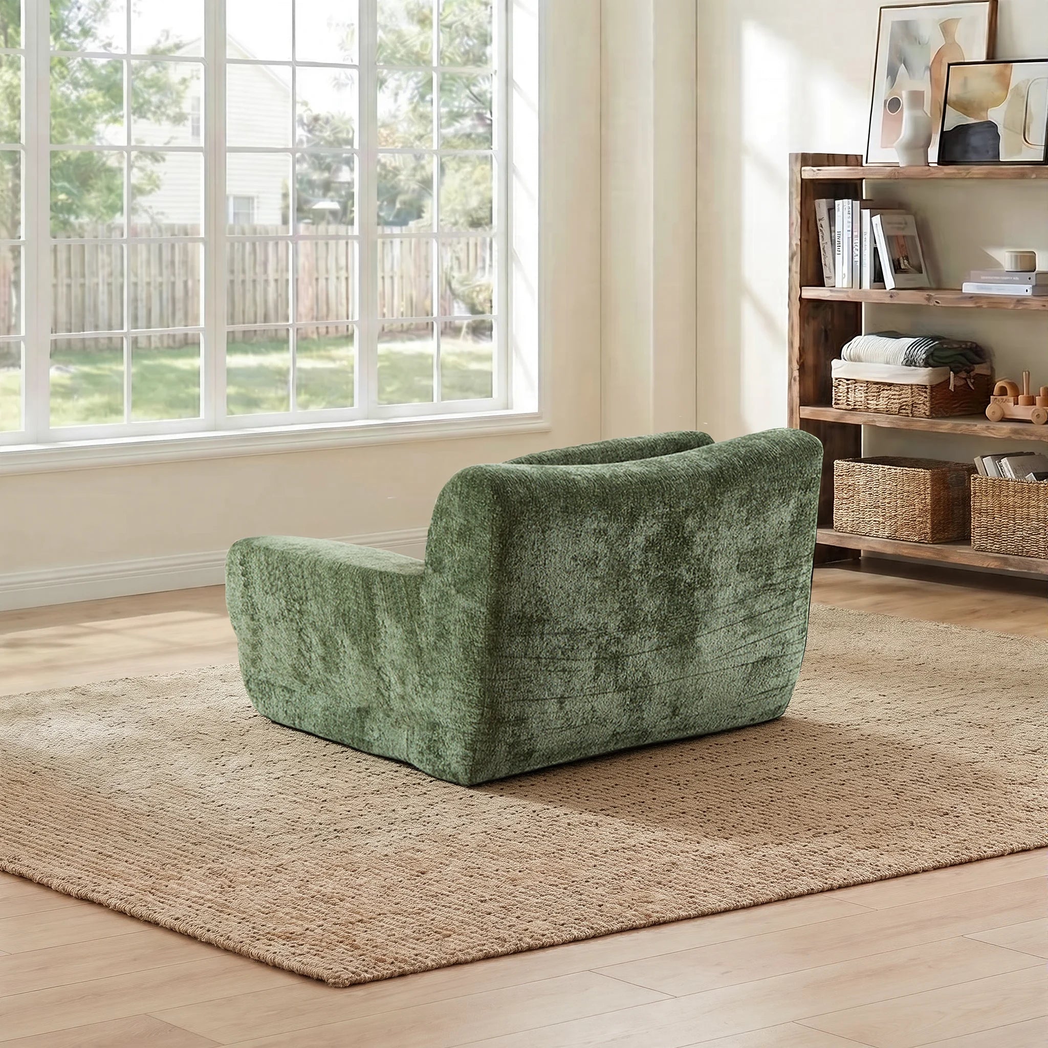 Compressed modular sofa bed in textured green upholstery, low lounge position with back bolster