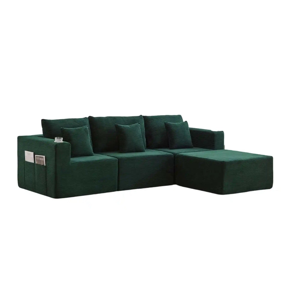 Green modular sectional sofa with back cushions and chaise seating